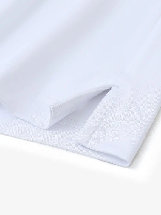 Close-up detail of hem slit on Everyday Solid Jersey Polo in WHITE, featuring precise stitching.