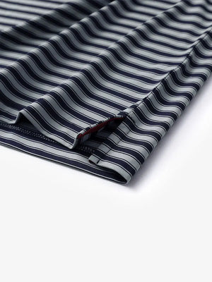Detailed shot of the hem slit on the Navy Grey Yarn Dyed Stripe Polo – subtle craftsmanship