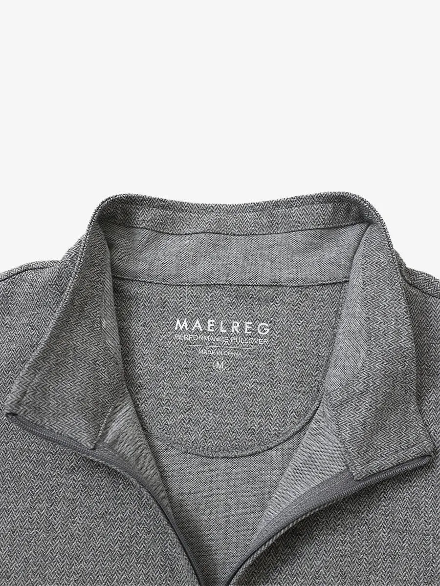 Close-up of collar and interior logo detail on SMOKY GRAY HERRINGBONE Premium Jacquard Quarter Zip Pullover.								
