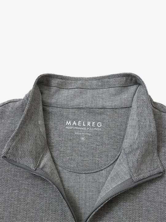 Close-up of collar and interior logo detail on SMOKY GRAY HERRINGBONE Premium Jacquard Quarter Zip Pullover.								
