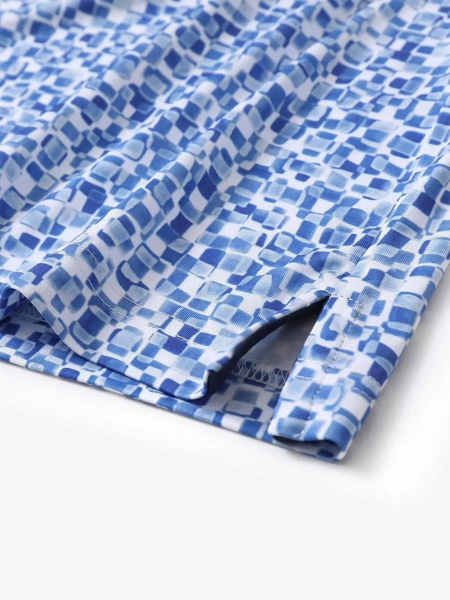 Hem slit detail of MAELREG Performance Jersey Print Polo in Blue White Mosaic – comfort & movement
