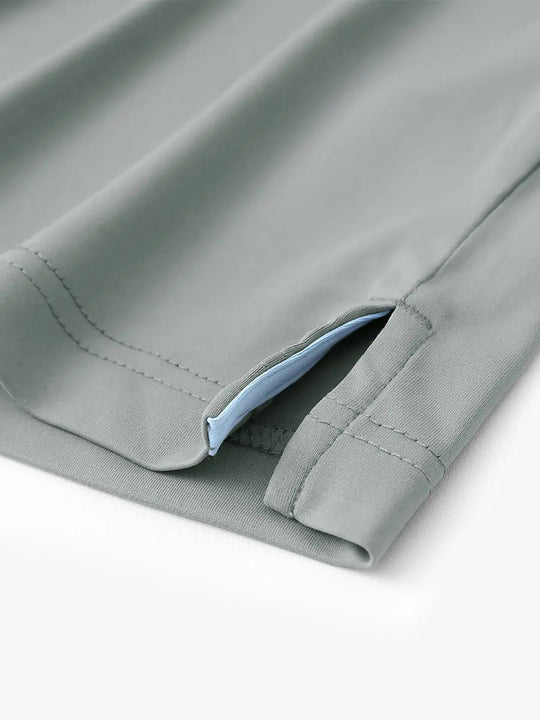 Hem slit detail of LIGHT GREY Stylish Chest Print Snap Polo highlighting stitching and finish