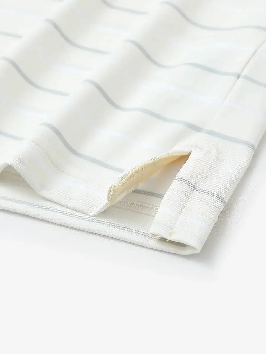 Hem slit detail of BEIGE STRIPE Kids Stylish Stripe Polo Shirt, highlighting finish and stitching.