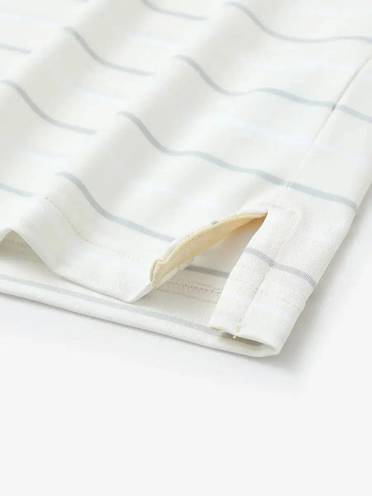 Hem slit detail of BEIGE STRIPE Kids Stylish Stripe Polo Shirt, highlighting finish and stitching.