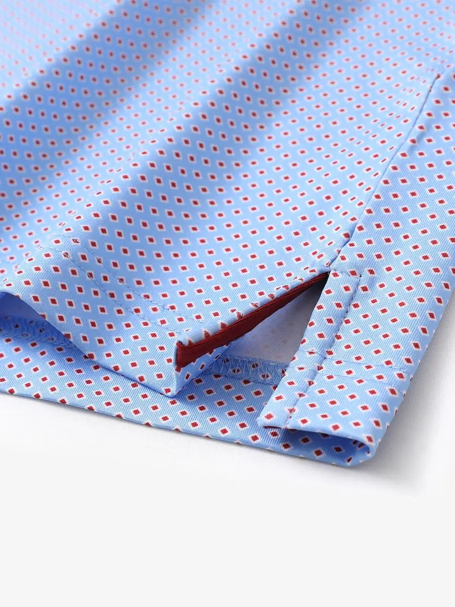 Hem slit detail of MAELREG Performance Jersey Print Polo in Blue Red Diamond – comfort & movement