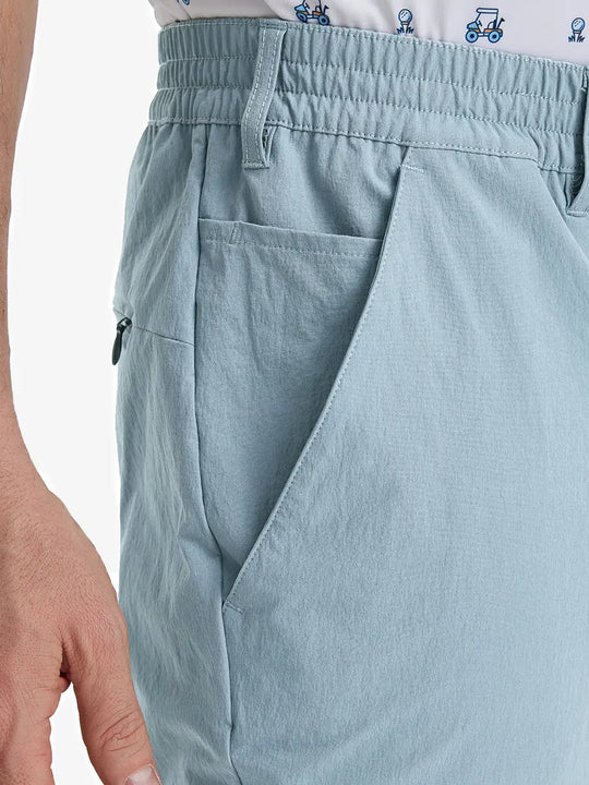 Close-up of front pocket on Performance Water Resistant Pants in POWDER BLUE，highlighting pocket design.