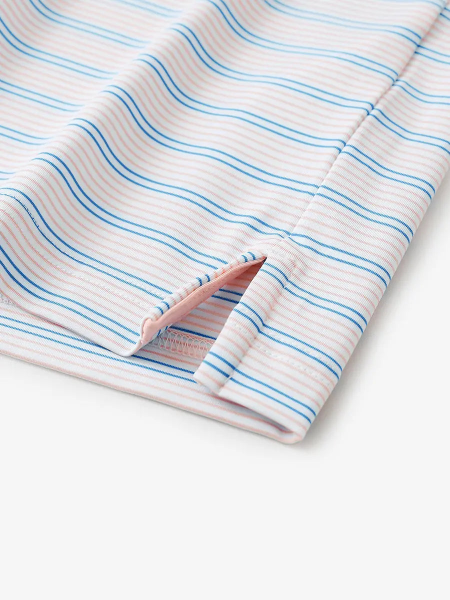 Close-up of side hem slit on Pink Blue Stripe Performance Stripe Golf Shirt
