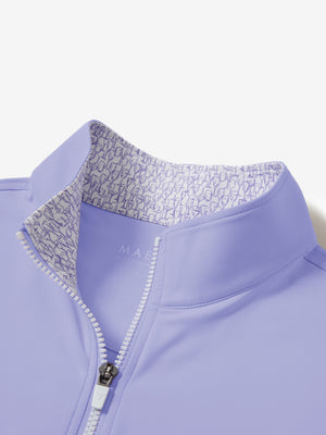 Collar zipper and inner neck pattern detail of the lightweight golf quarter zip pullover in lavender.