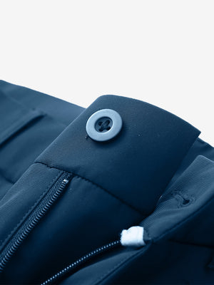 Waist detail of quick dry casual dress pants in blue indigo, featuring button and zipper design.