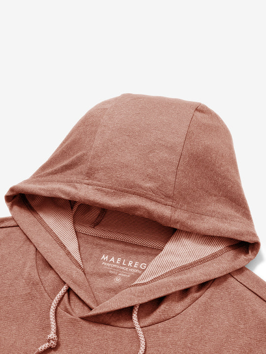 Hood detail of the classic heather pullover hoodie in brick melange, showcasing fabric and stitching.