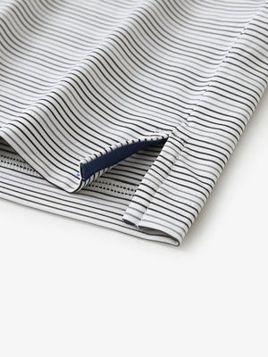 Close-up of side hem slit on Dark Grey Neutral Grey Performance Stripe Golf Shirt