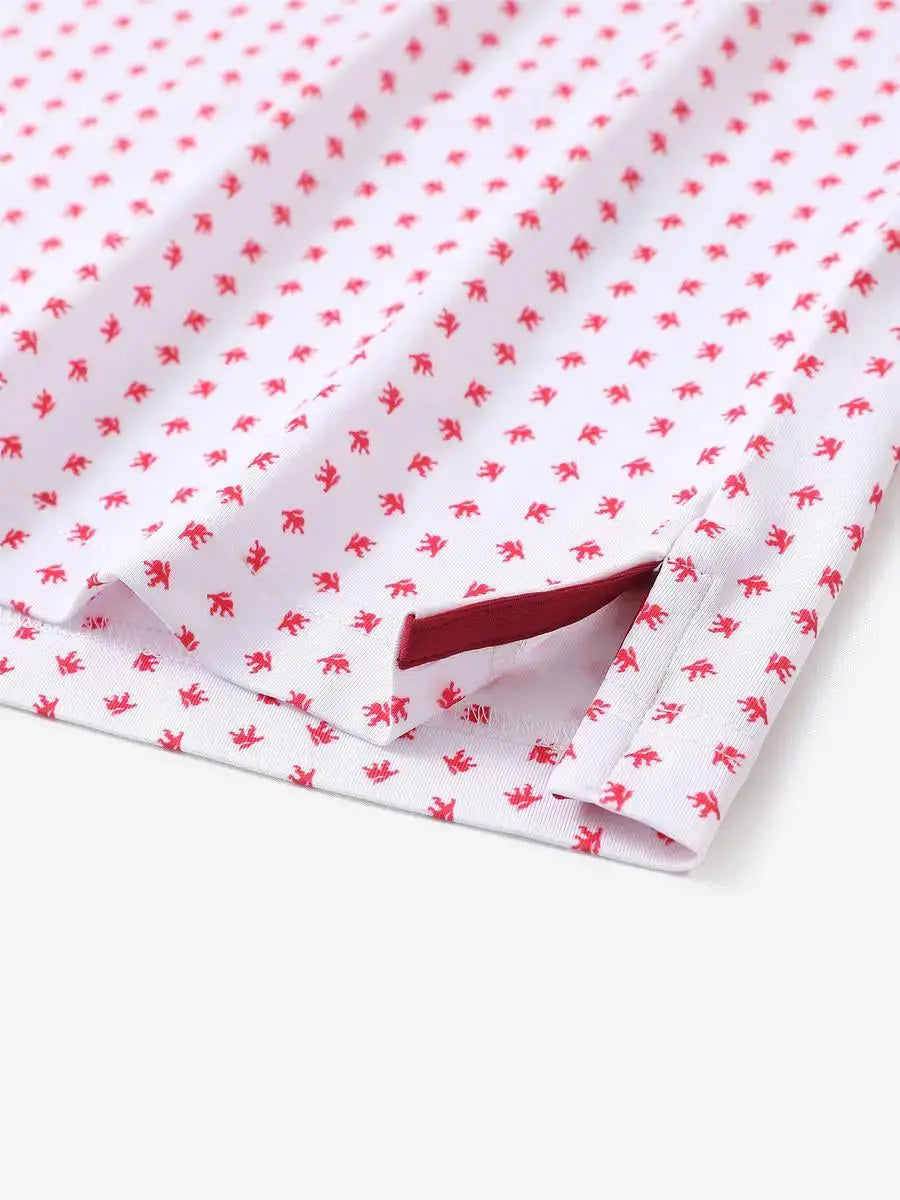 Detailed close-up of side hem slit on WHITE RED LION Performance Print Boys Golf Polo for comfort