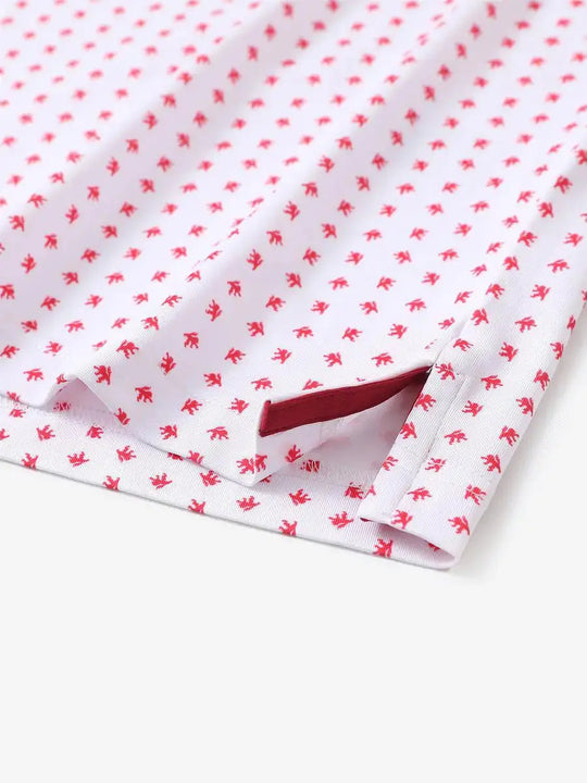 Detailed close-up of side hem slit on WHITE RED LION Performance Print Boys Golf Polo for comfort