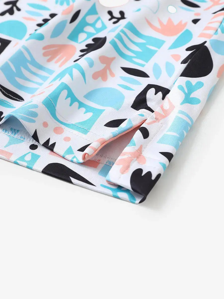 Detailed close-up of side hem slit on IRREGULAR GEO Performance Print Boys Golf Polo for comfort