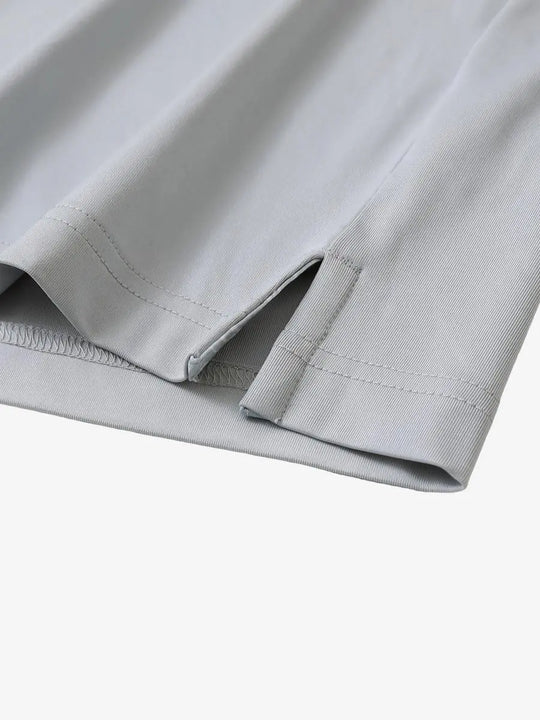 Close-up of side slit detail on the Silver Grey Everyday Classic Solid Polo hem