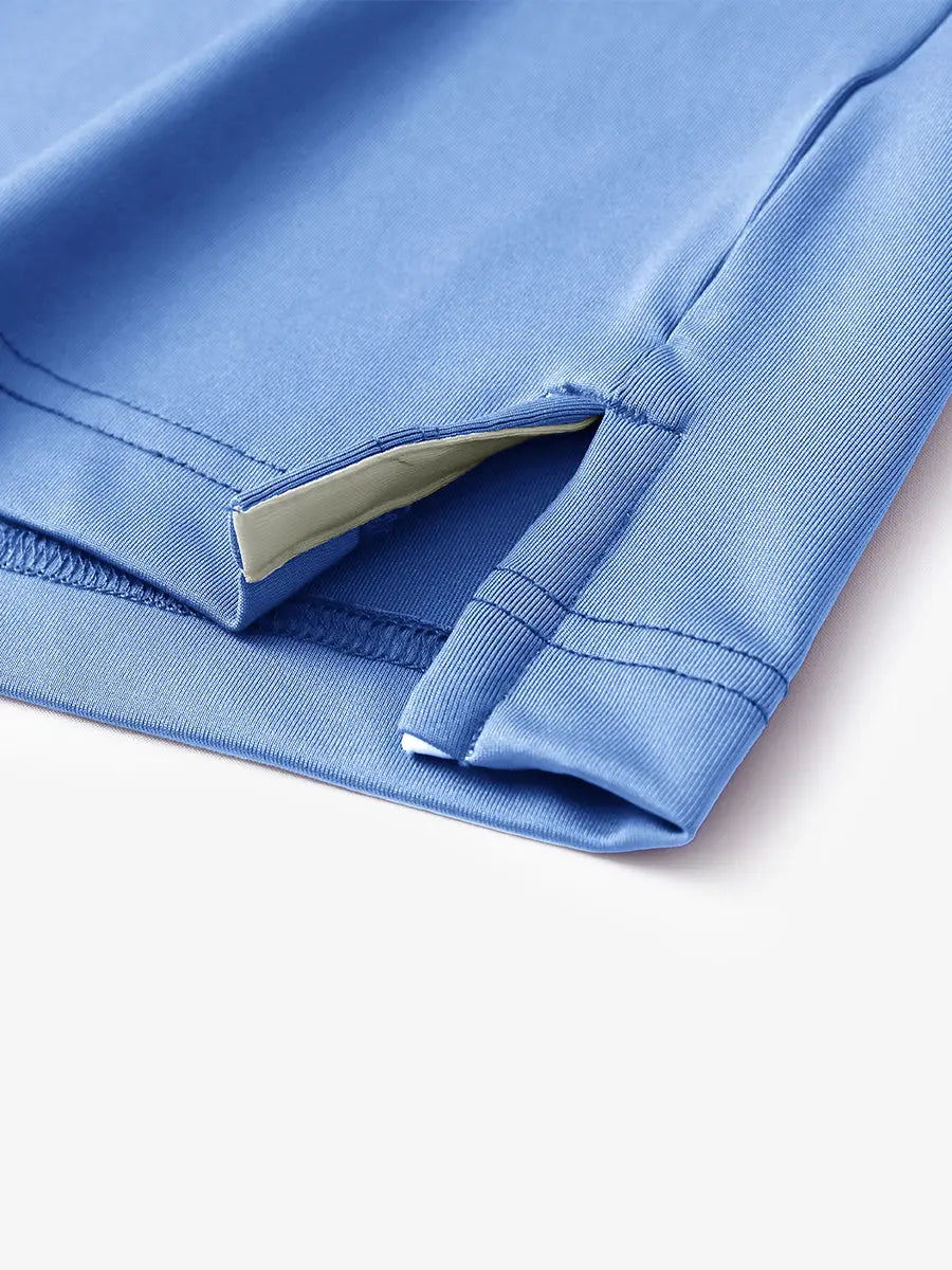 Hem slit detail of LIGHT BLUE Moisture Wicking Color Block Polo Shirt highlighting stitching and finish.