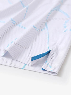 Hem slit detail of MAELREG Performance Jersey Print Polo in Abstract Stripe – comfort & movement