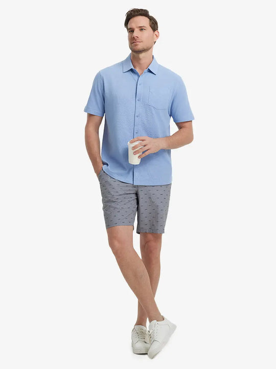 Full-body view of model holding takeaway drink cup in LIGHT BLUE Cotton Blend Plain Shirt.