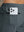 Back pocket detail of Water Resistant Comfy Fleece Golf Joggers in sky blue, holding smartphone