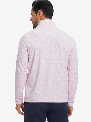 Back upper body angle of the pink artichoke full print quarter zip pullover, model turns head slightly.