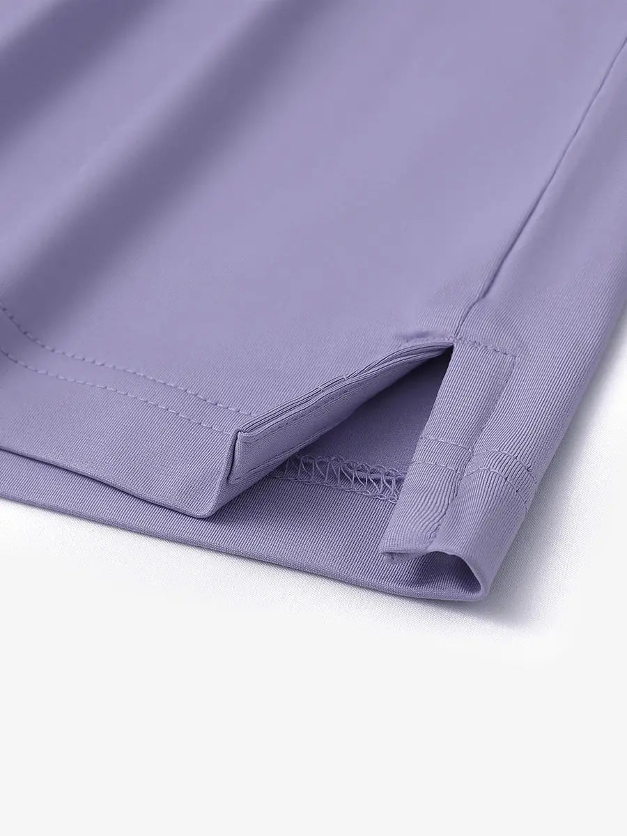 Close-up detail of hem slit on Everyday Solid Jersey Polo in LAVENDER, showcasing fine stitching.