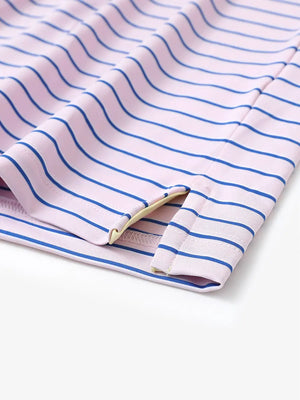 Detail of hem slit on LIGHT PINK/COBALT STRIPE Polo with clean stitched finish