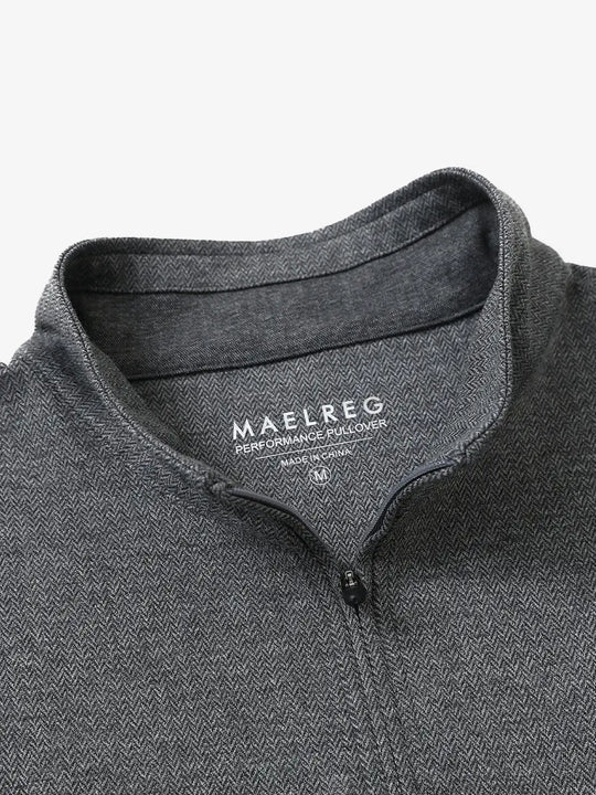 Close-up of collar and interior logo detail on DARK GRAY HERRINGBONE Premium Jacquard Quarter Zip Pullover.								
