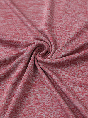 Close-up of dusty rose heather modern fit melange polo fabric showing soft and textured surface.