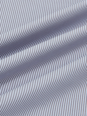 Close-up fabric view of long sleeve pinstripe jersey polo, smooth knit with subtle grey white stripe stripes