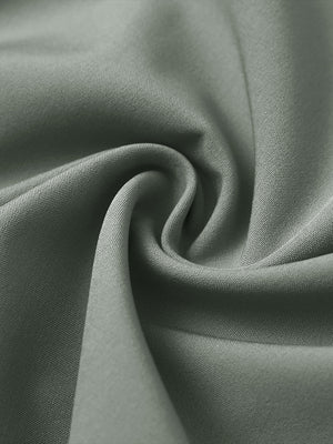 Fabric close-up of traditional breathable solid shirt, soft weave with airy olive green finish