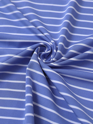 Close-up of bluish blue/white stripe popular yarn dyed stripe polo fabric showing crisp lines and soft texture.