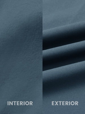 Close-up of inside and outside fabric of water-resistant fleece golf vest in bluish grey, highlighting material texture and durability for optimal performance.