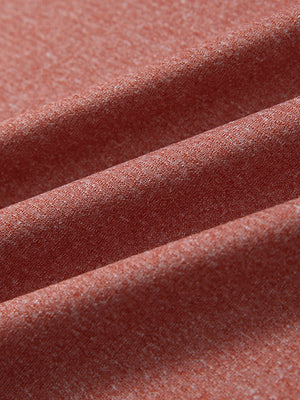 Close-up fabric detail of moisture wicking quarter zip pullover, smooth knit and quick-dry feel in brick melange