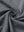 Close-up fabric detail of skin-friendly long sleeve melange polo, soft blend texture with black grey heather tone