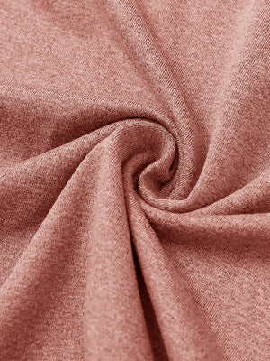 Close-up of melange fabric on quarter zip pullover, showing texture and detail in brick melange.