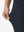 Detail view of stretch fabric on navy women's regular fit stretchy golf pants