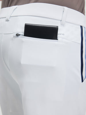 Detail view of back pocket on white breathable casual slacks with 4 pocke