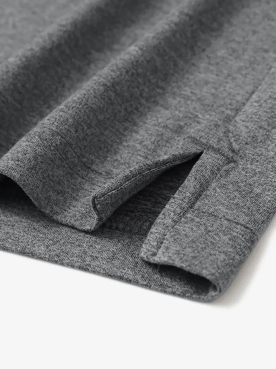 Black Grey Heather Skin-friendly Long Sleeve Melange Polo – close-up detail of side hem slit