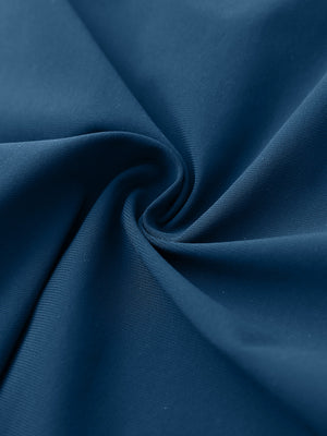 Close-up of quick dry casual shorts with 4 pockets fabric, breathable blue indigo texture with smooth finish