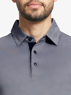 Model front close-up from nose to chest wearing Ventilated Heather Jacquard Polo in NAVY HEATHER