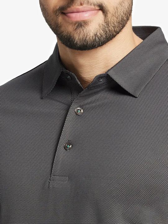 Close-up front view from nose to chest wearing BLACK Performance Ananas Jacquard Polo