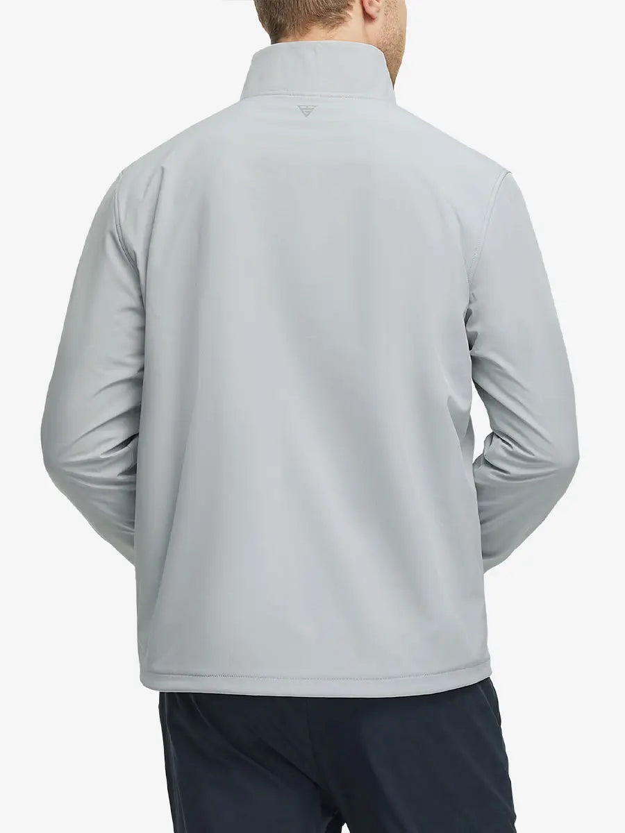 Back half-body view of the model highlighting the Light Grey jacket’s clean silhouette