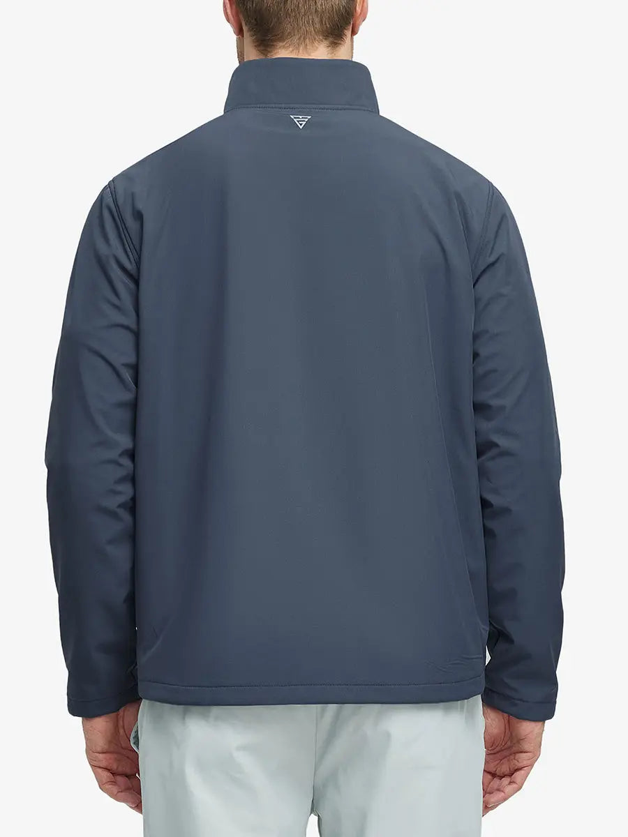 Back half-body shot of the model showcasing the Misty Blue Softshell Jacket’s clean silhouette
