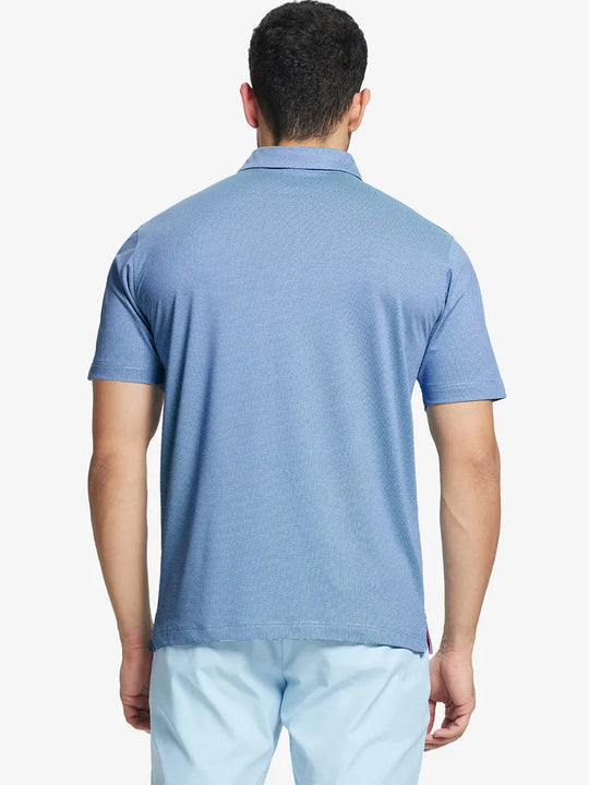 Rear half-body shot showing fit of AQUA Performance Ananas Jacquard Polo