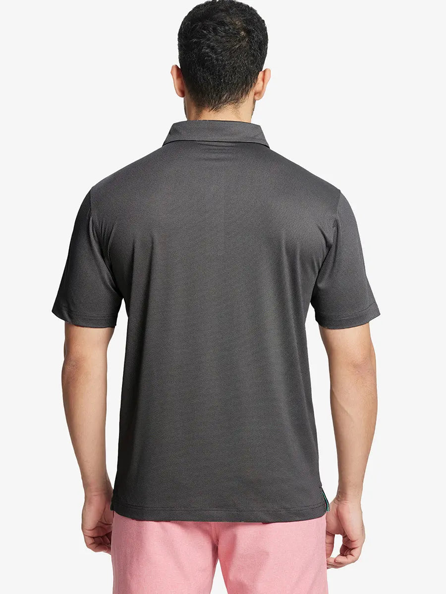 Rear half-body shot showing fit of BLACK Performance Ananas Jacquard Polo