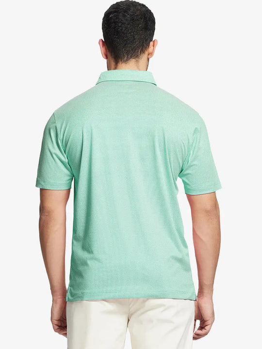 Rear half-body shot showing fit of ICE GREEN Performance Ananas Jacquard Polo