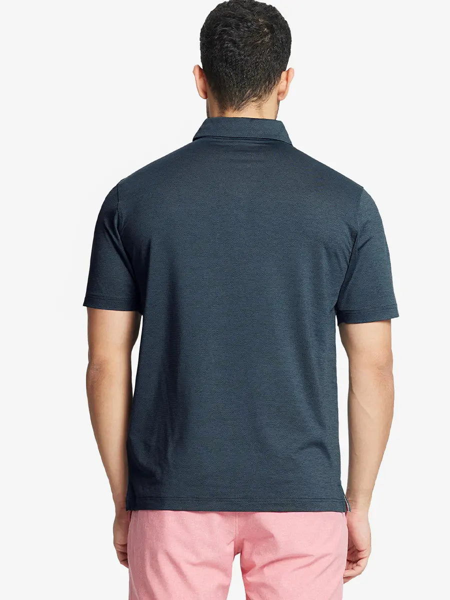 Rear half-body view showing fit and jacquard pattern of Ventilated Heather Jacquard Polo – JUNGLE GREEN HEATHER