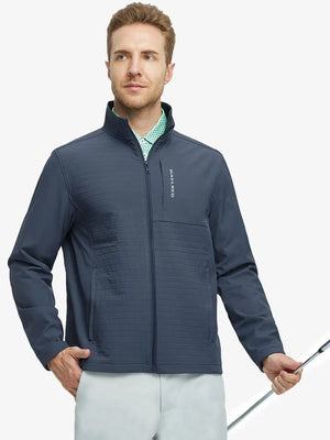 Front-facing half-body shot of model holding a golf club in the Misty Blue Softshell Jacket – ready for play