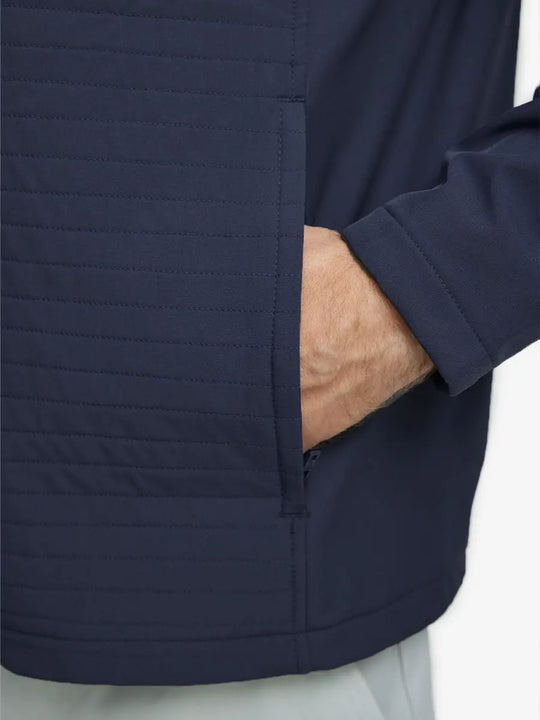 Detail shot of hand in right pocket highlighting the Navy Jacket’s functional side pocket