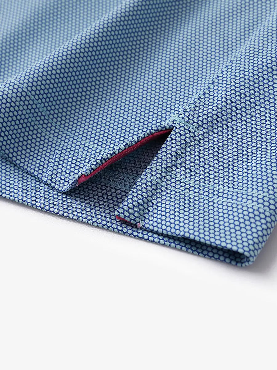 Close-up detail of side hem slit on AQUA Performance Ananas Jacquard Polo